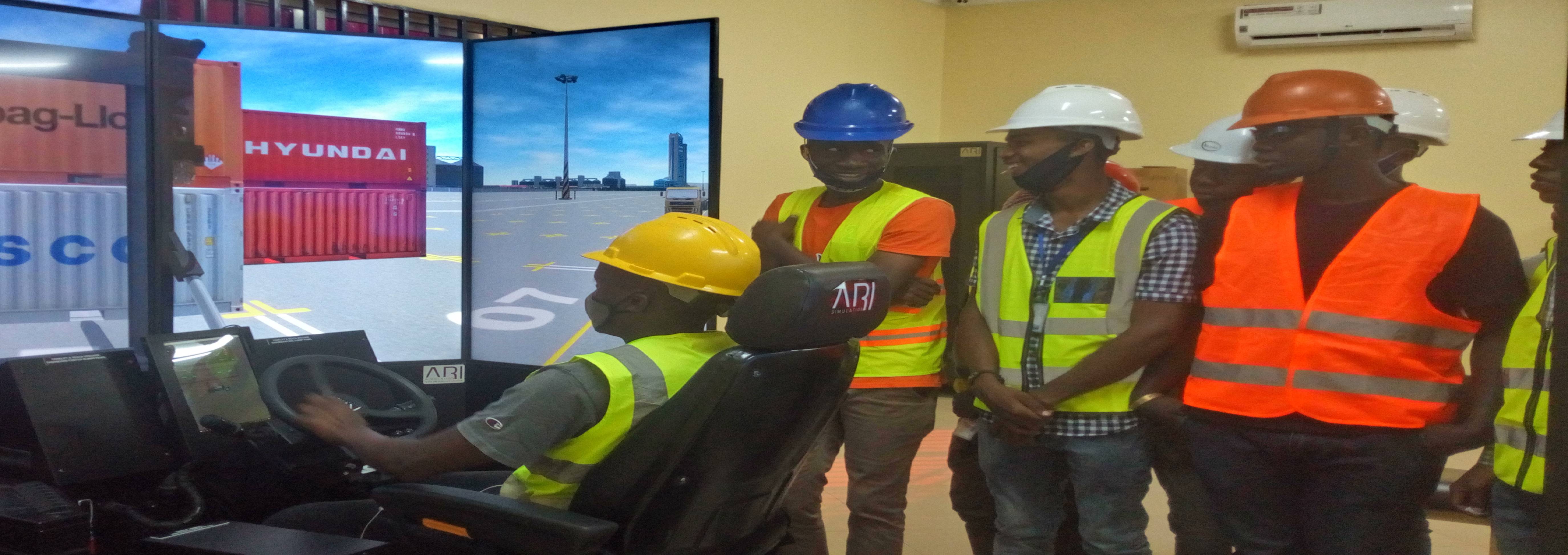 Students Operating Forklift Machine in Driving Simulator